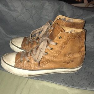 These leather embossed high tops were bought in UK